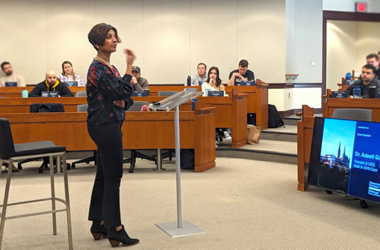 Dr. Adeeti Gupta speaking at George Town university. The picture is showing Dr. Adeeti Gupta's passion for teaching